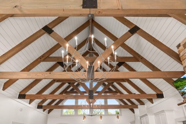 Ceiling of room painted white with douglas fir timber elements